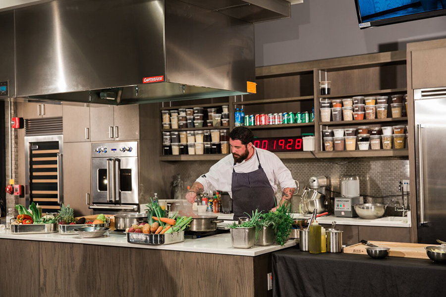 A person cooking in a kitchen