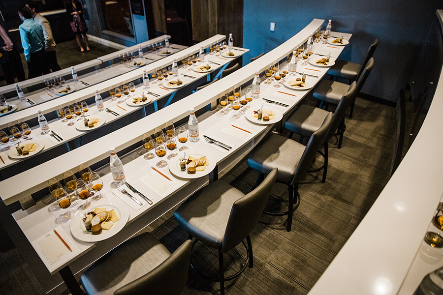 A long table with plates of food on it