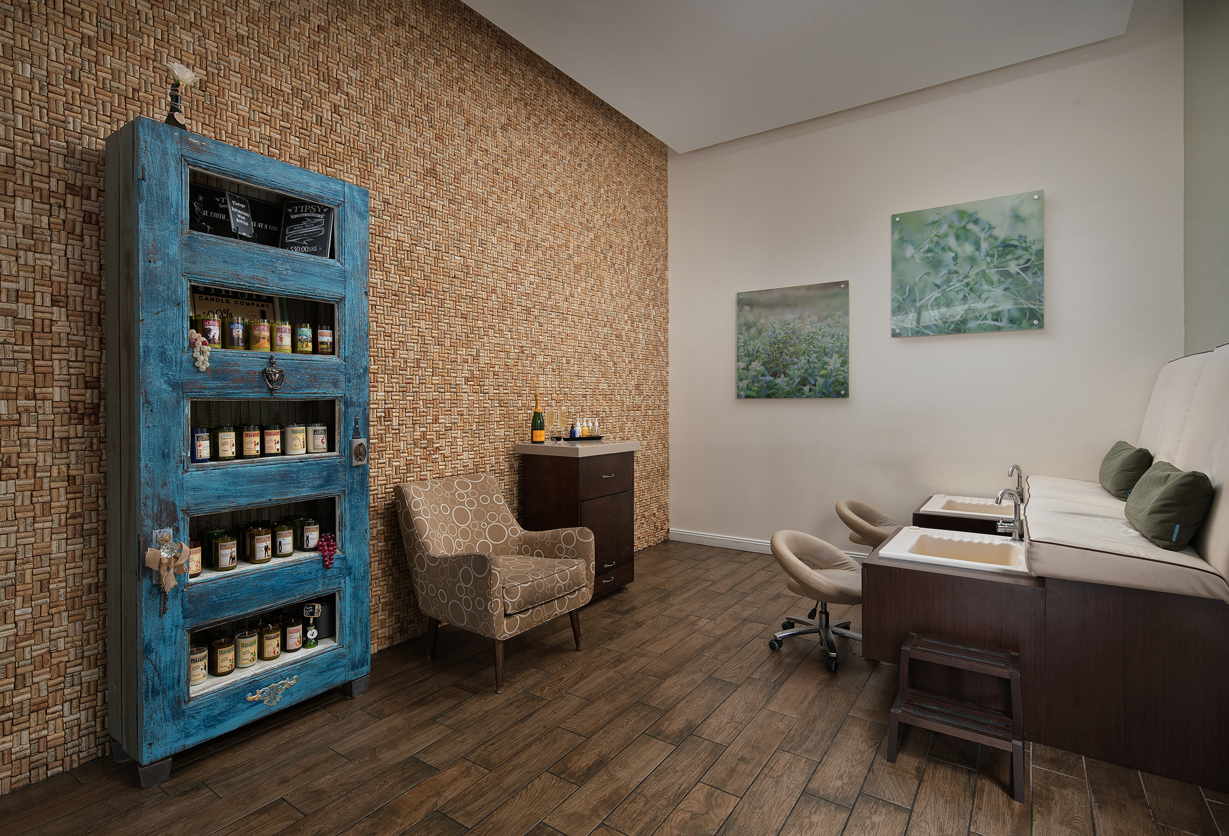 A room with a blue shelf and chairs