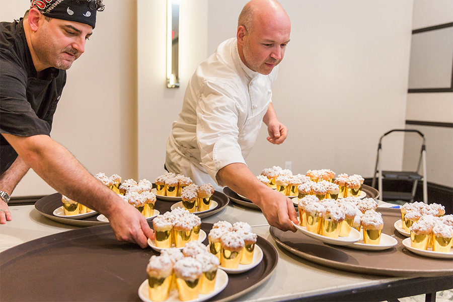 A group of people serving food