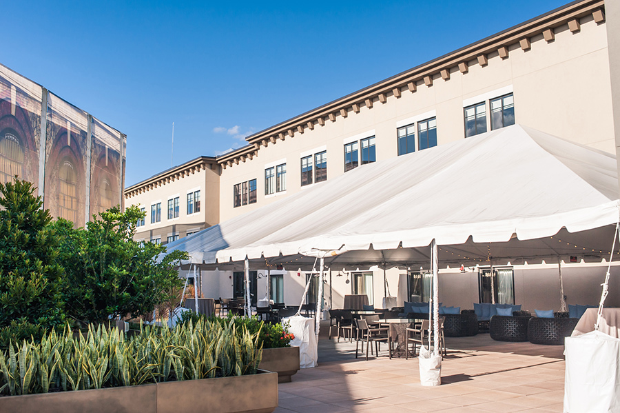 A building with a tent in front of it