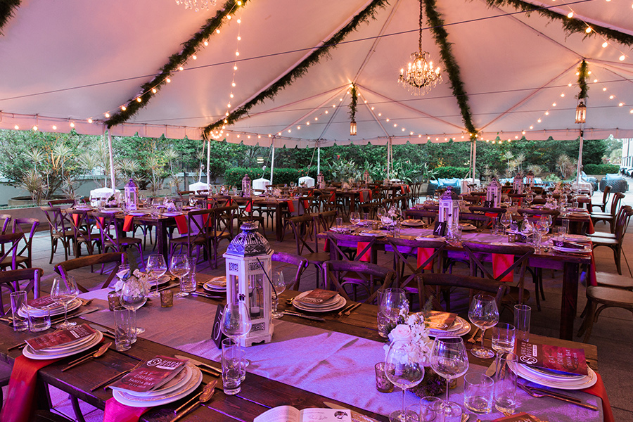 A tent with tables and chairs