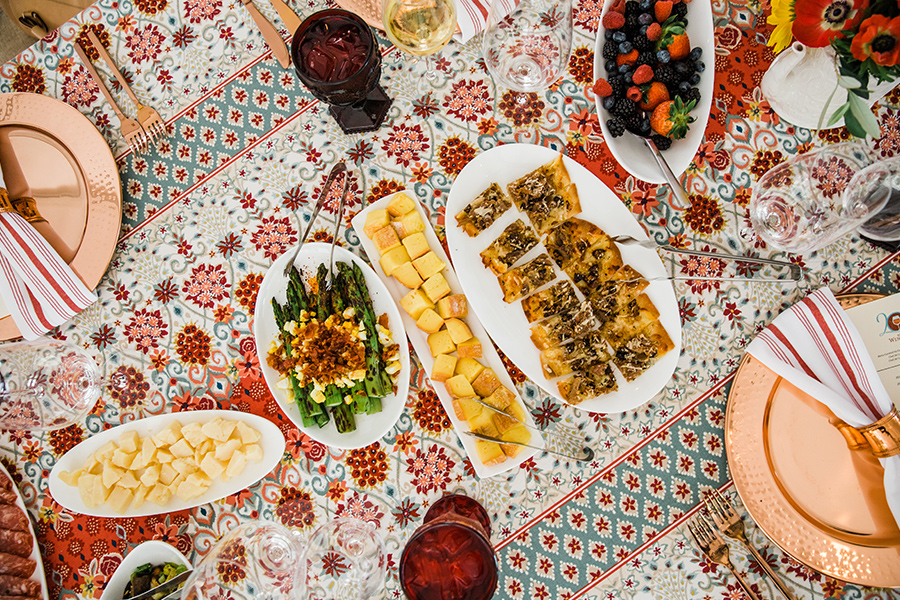 A table with plates of food on it