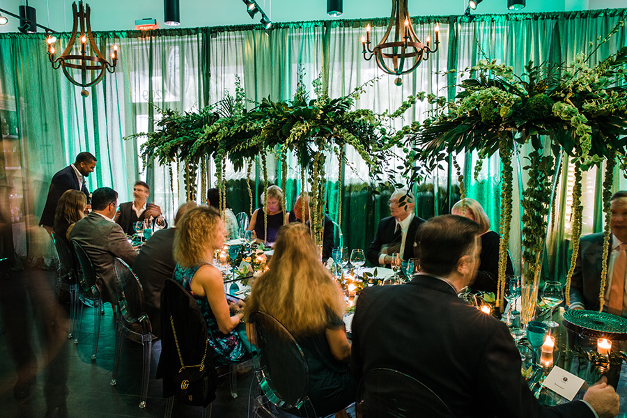 A group of people sitting at tables