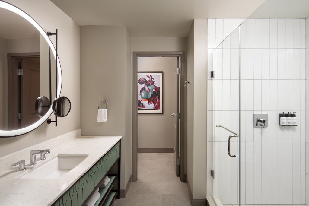 bathroom with sink vanity and walk in shower