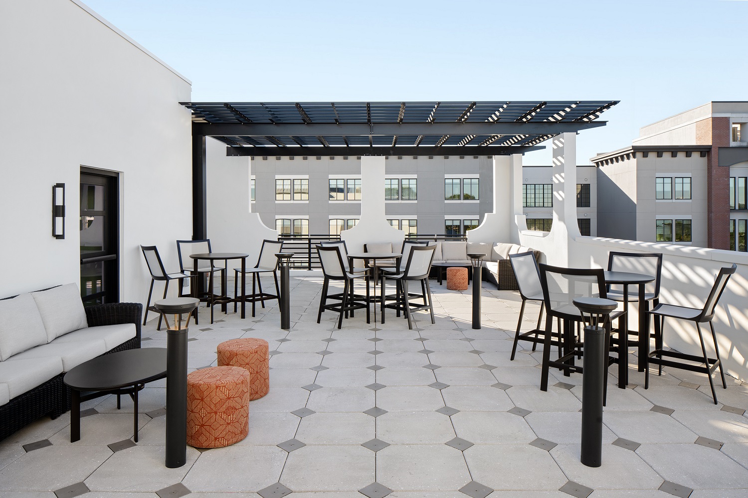 outdoor terrace with high-top tables and chairs