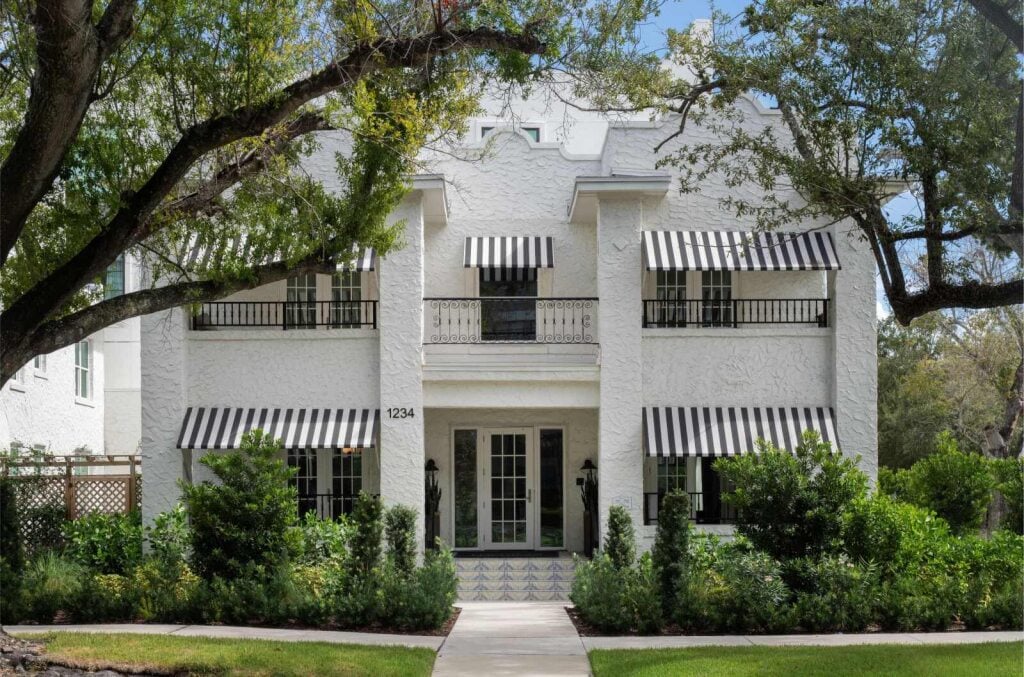 The exterior of a historic hotel apartment building across from Epicurean Hotel in Hyde Park District of South Tampa Florida