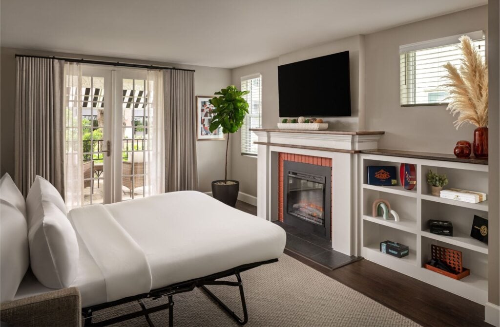 A living room pull-out sofa bed in a historic hotel apartment across from Epicurean Hotel in Hyde Park District of South Tampa Florida