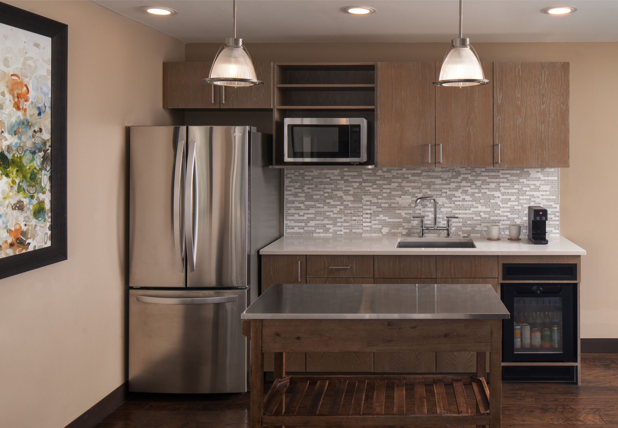 a kitchenette in a balcony suite in Epicurean Hotel in South Tampa