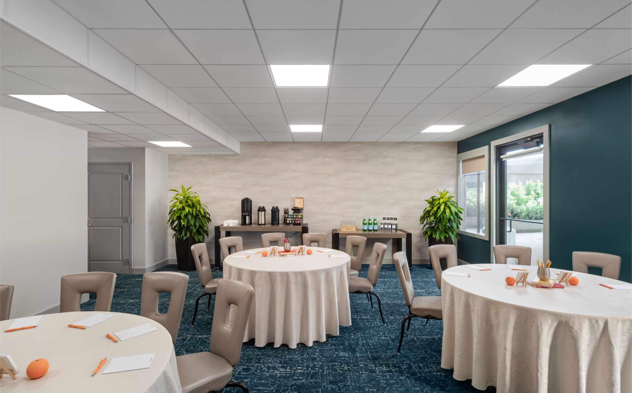 A meeting room with round tables at Epicurean Hotel in South Tampa